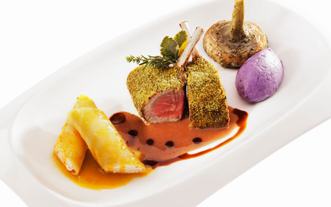 Rack of pré salé lamb in herb crust with mustard a lancienne and balsamic sauce